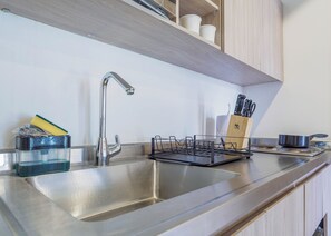 Fridge, microwave, stovetop, coffee/tea maker