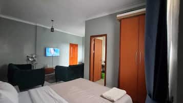 1 habitación, tabla de planchar con plancha, wifi y ropa de cama