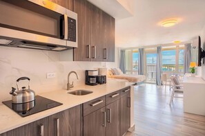 Fridge, microwave, stovetop, coffee/tea maker