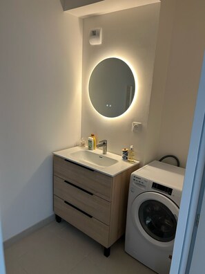Hair dryer, towels, soap, shampoo