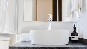 Shower, hair dryer, towels, shampoo