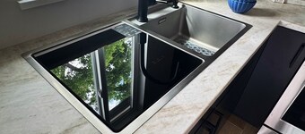 Cozy studio with modern kitchen in unit laundry and AC close to hiking trails.