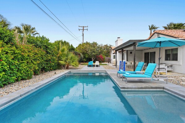 Outdoor pool, pool umbrellas, pool loungers