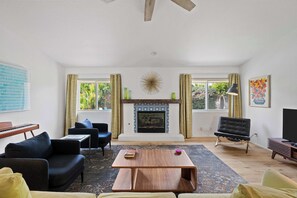 House, Multiple Beds, Pool Access, Mountain View (Hacienda Hideaway) | Living area | 42-inch flat-screen TV with digital channels, fireplace