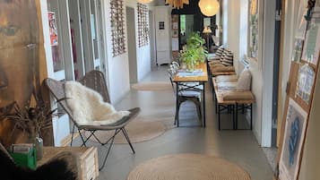 Classic Triple Room, 3 Single Beds, Housekeeping, City View | Living area