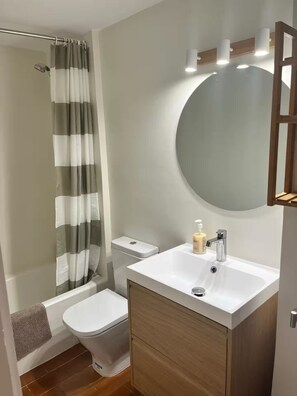 Hair dryer, towels, soap, toilet paper
