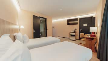 Family Room | In-room safe, desk, laptop workspace, blackout curtains