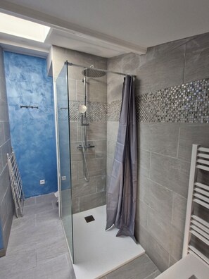 Shower, hair dryer, towels, soap