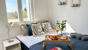 2 dormitorios, tabla de planchar con plancha, wifi y ropa de cama