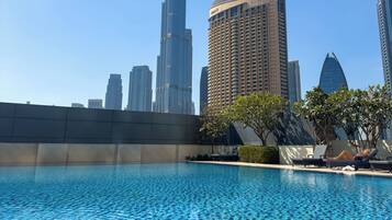 Outdoor pool, open 8:00 AM to 7:00 PM, pool umbrellas, sun loungers