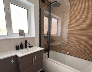 Hair dryer, towels, soap, shampoo