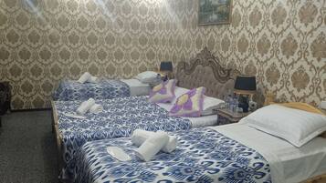 Family Room, Multiple Beds, Non Smoking, Garden View | Soundproofing, iron/ironing board, free WiFi