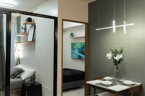 Living room - 2-bedroom Elegant Condo With Sunrise & Mountain View (Butuan)