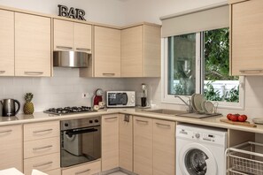 Microwave, coffee/tea maker, cookware/dishes/utensils