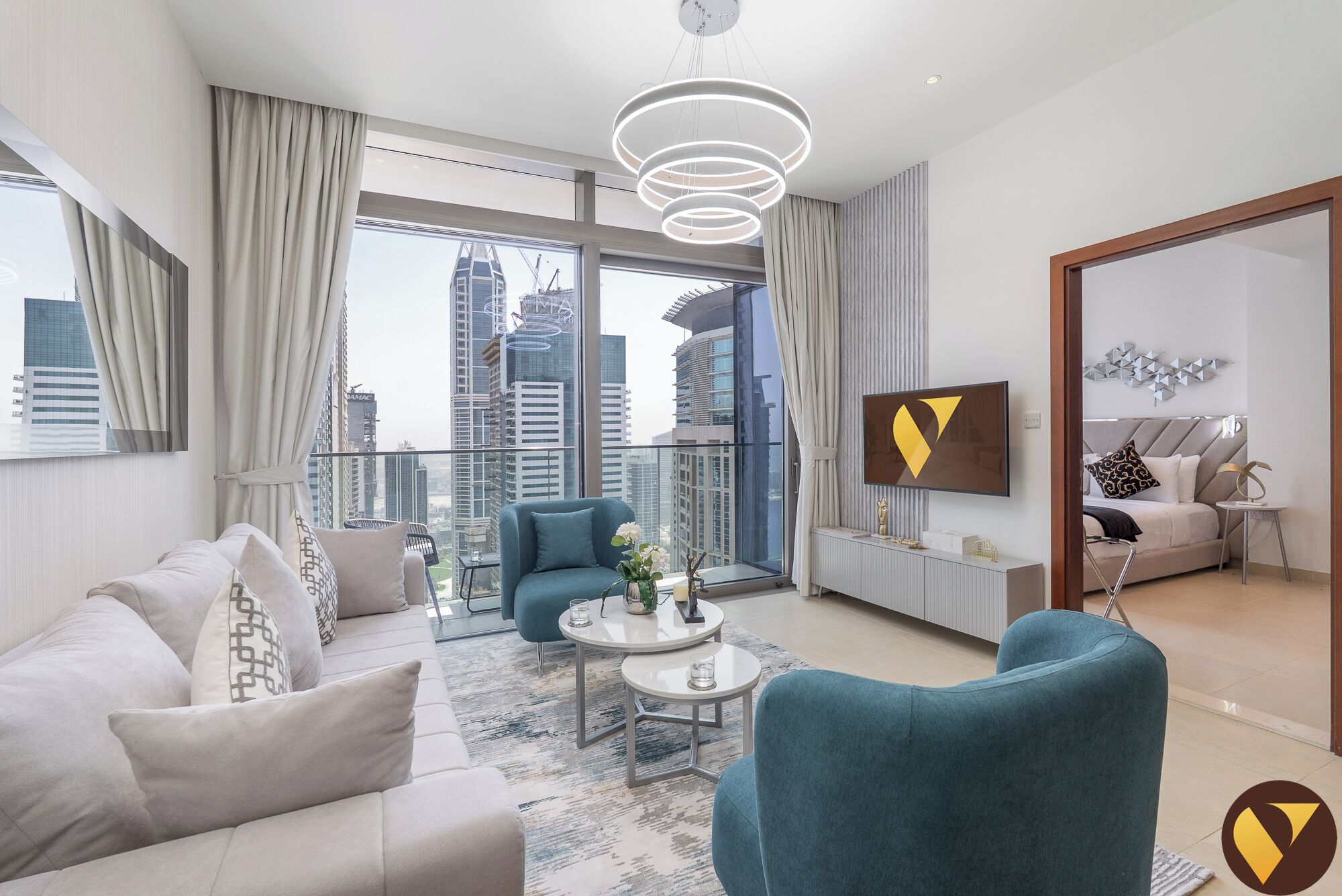 Luxury Apartment, Balcony | Living area | 65-inch Smart TV with cable channels