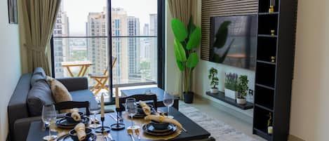 Luxury Apartment, Balcony, City View | In-room dining