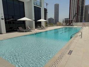 Outdoor pool - Binghatti Gardenia High Floor Olympic  (Dubai)
