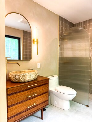 Shower, towels, soap, toilet paper