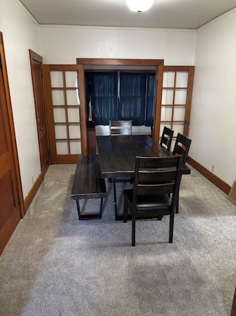 Dining. Charming 1-bedroom Duplex with AC, WiFi, Gym access etc...
