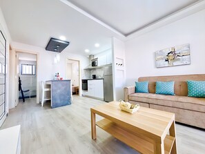 Apartamento, 2 quartos, terraço, vista para o jardim | Sala de estar