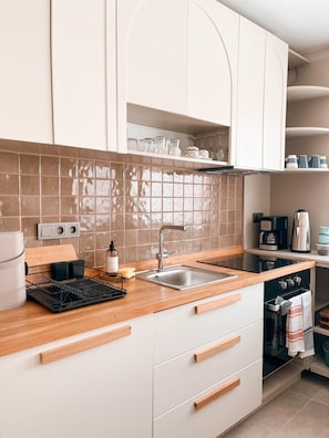 Apartamento superluxo, sacada, vista para a montanha | Cozinha privada | Geladeira grande, cadeirão de bebê