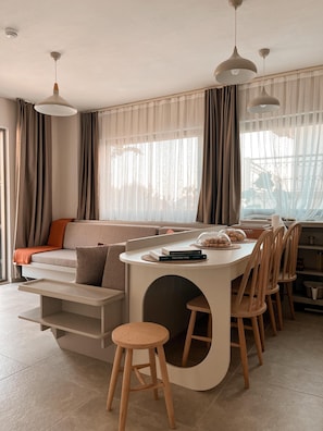 Luxury Condo, Partial Sea View | Living area