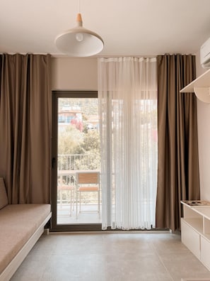 Luxury Apartment, Balcony, Mountain View | Living area