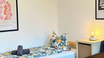 Deluxe Apartment | Living area | 30-inch flat-screen TV with cable channels