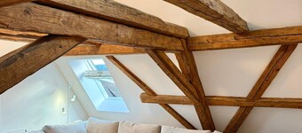 Good Wood Apartment- The Nest I Modern half-timbered house on the market square in Freudenstadt