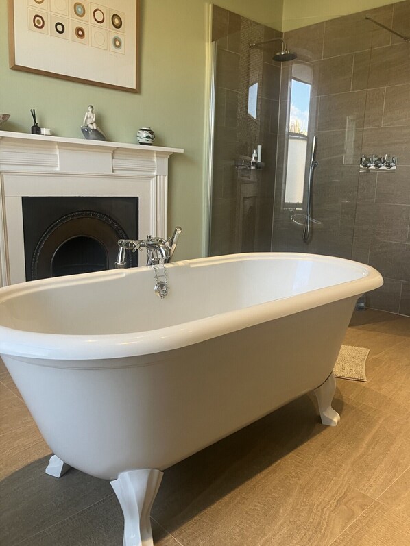 Shower, hair dryer, towels, toilet paper