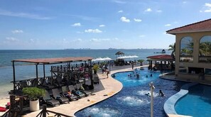2 outdoor pools, open 7:30 AM to 8:30 PM, pool loungers