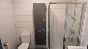 Shower, towels, toilet paper