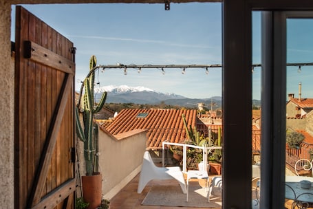 Interior. Grand Studio with Panoramic Terrace – Bohemian Chic Loft in 17th-Century Building
