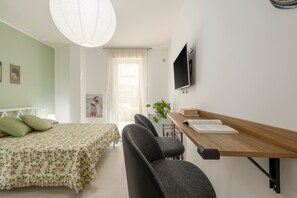 1 chambre, fer et planche à repasser, Wi-Fi gratuit, draps fournis