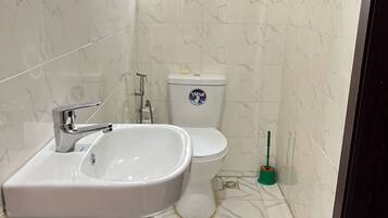 Shower, towels, toilet paper