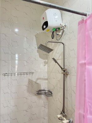 Shower, towels, toilet paper