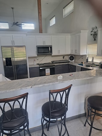 Private kitchen. Charming 1-bedroom resort with WiFi, AC and kitchen in The Acreage of Westlake