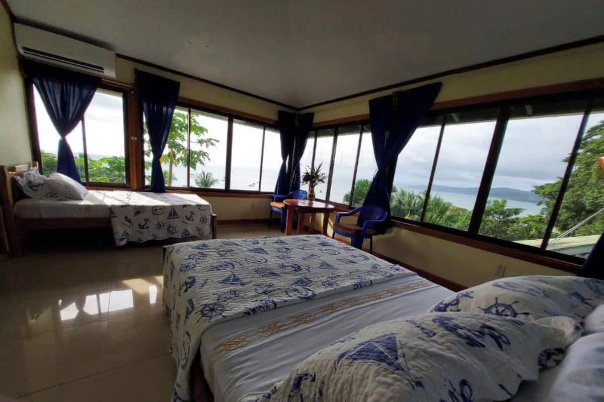 Chambre Triple Deluxe, vue océan | Wi-Fi gratuit, draps fournis