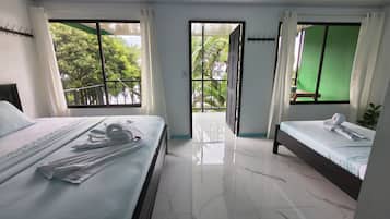 Standard Triple Room, Multiple Beds, Ocean View | Free WiFi, bed sheets