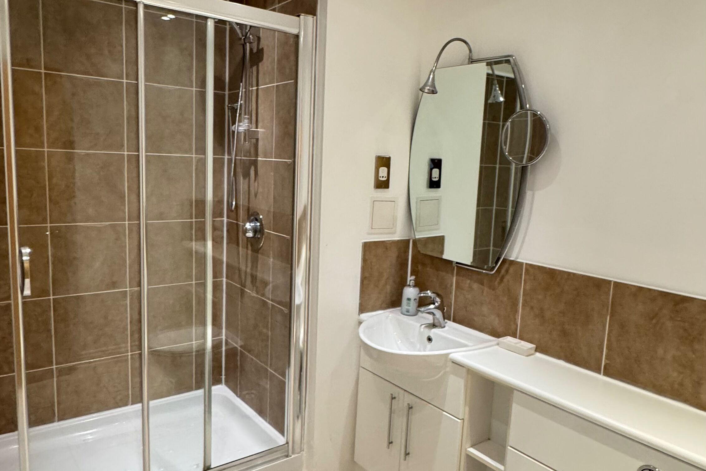 Combined shower/bathtub, deep-soaking bathtub, towels