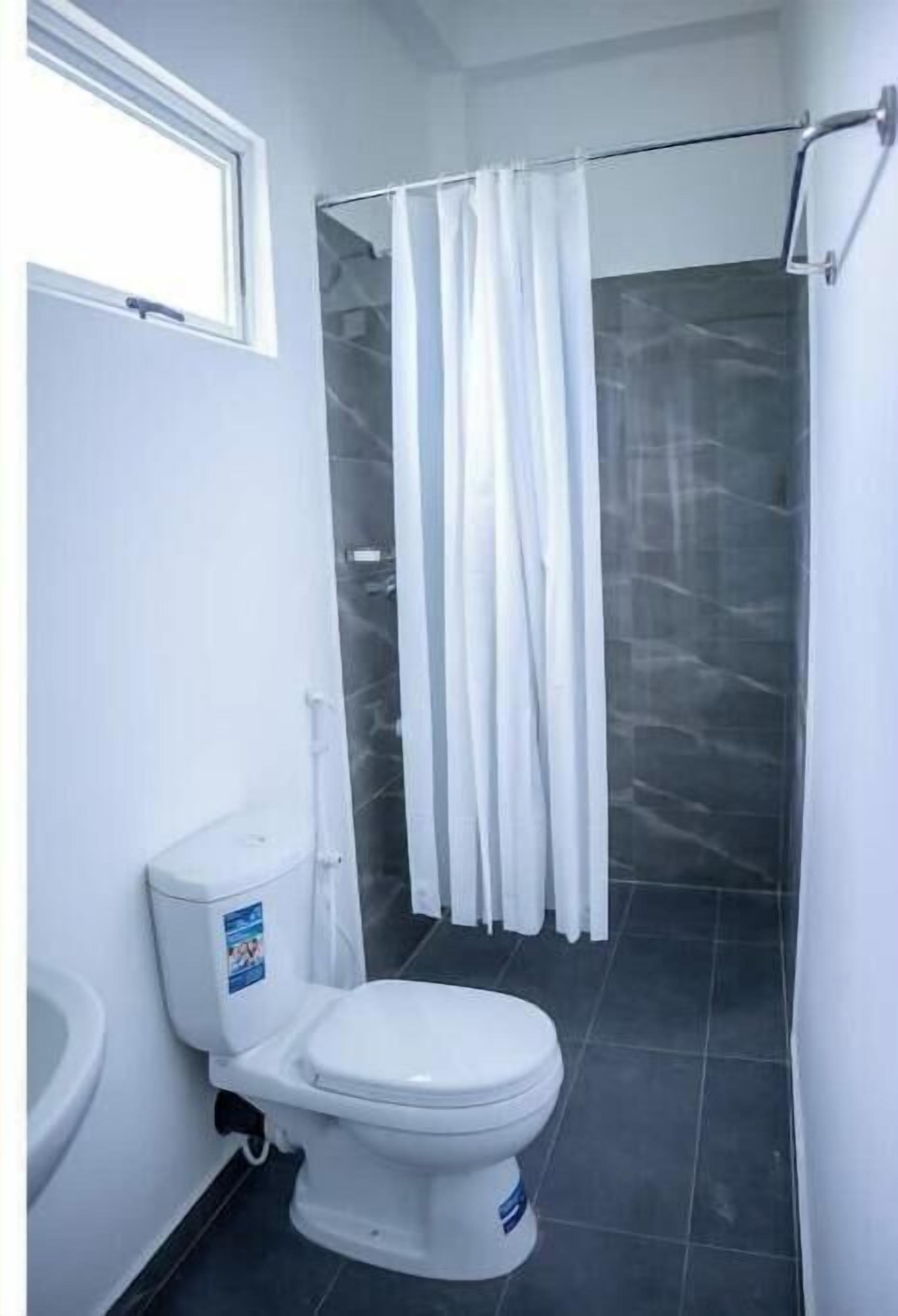 Shower, towels, soap, toilet paper