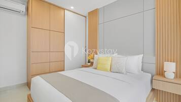 Apartemen, 1 kamar tidur, pemandangan kota | Ruang kerja ramah laptop, setrika/meja setrika, dan Wi-Fi gratis