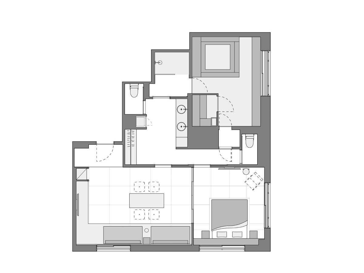 A floor plan of a hotel room with a living area, a separate dining space, a bathroom, and a kitchenette.