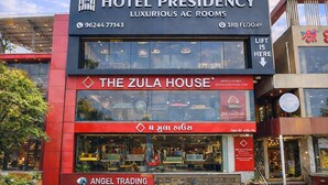 A hotel named 'Hotel Presidency' with 'Luxurious AC Rooms' and 'The Zula House' below. - Hotel Presidency (Surat)