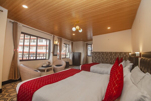 Deluxe Quadruple Room, Mountain View | Desk, free WiFi, bed sheets