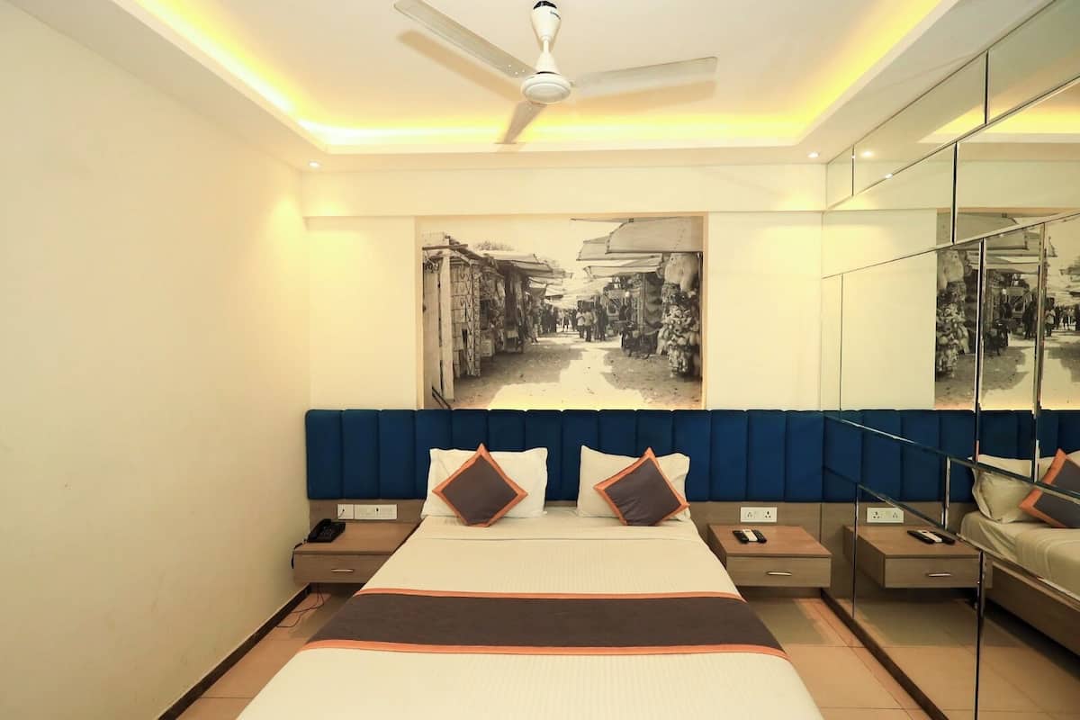 Executive kamer | Lakens van Egyptisch katoen, luxe beddengoed, een bureau, gratis wifi