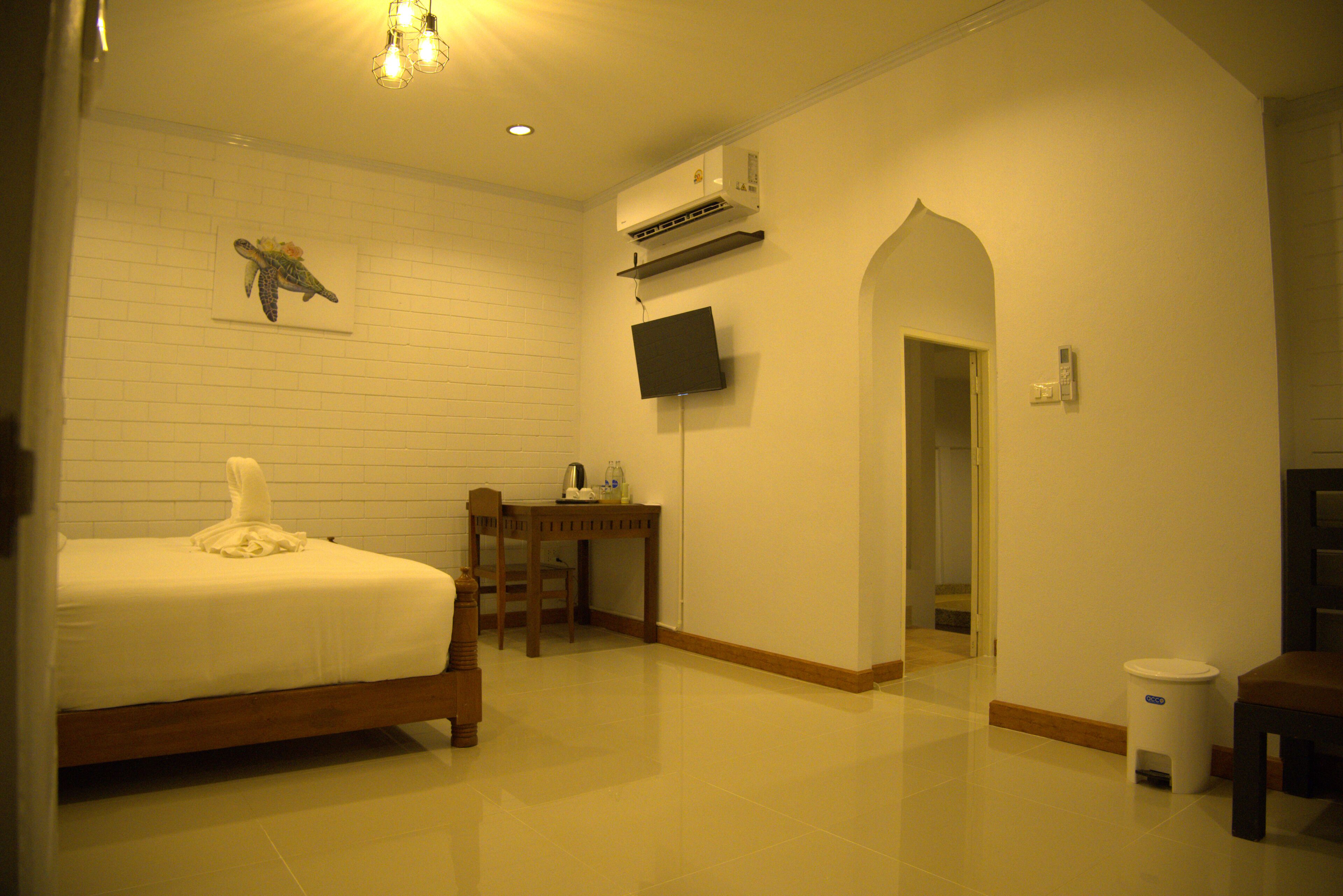 Deluxe Cottage | Frigobar, individualmente decorados, escrivaninha