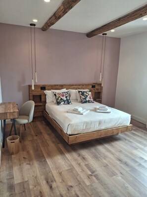 Premium bedding, memory-foam beds, soundproofing, iron/ironing board