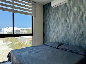 1 dormitorio, escritorio, tabla de planchar con plancha y wifi