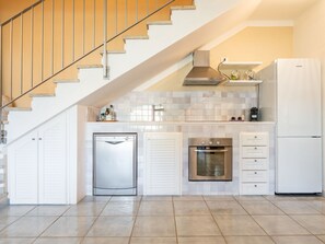 Fridge, oven, cookware/dishes/utensils